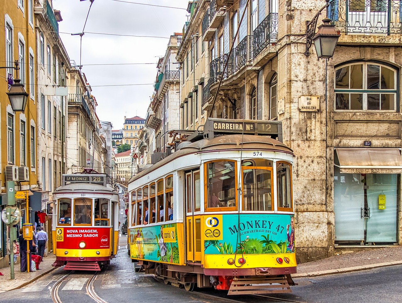 Tram on the streets of Lisbon, showcasing the city's architecture and culture.