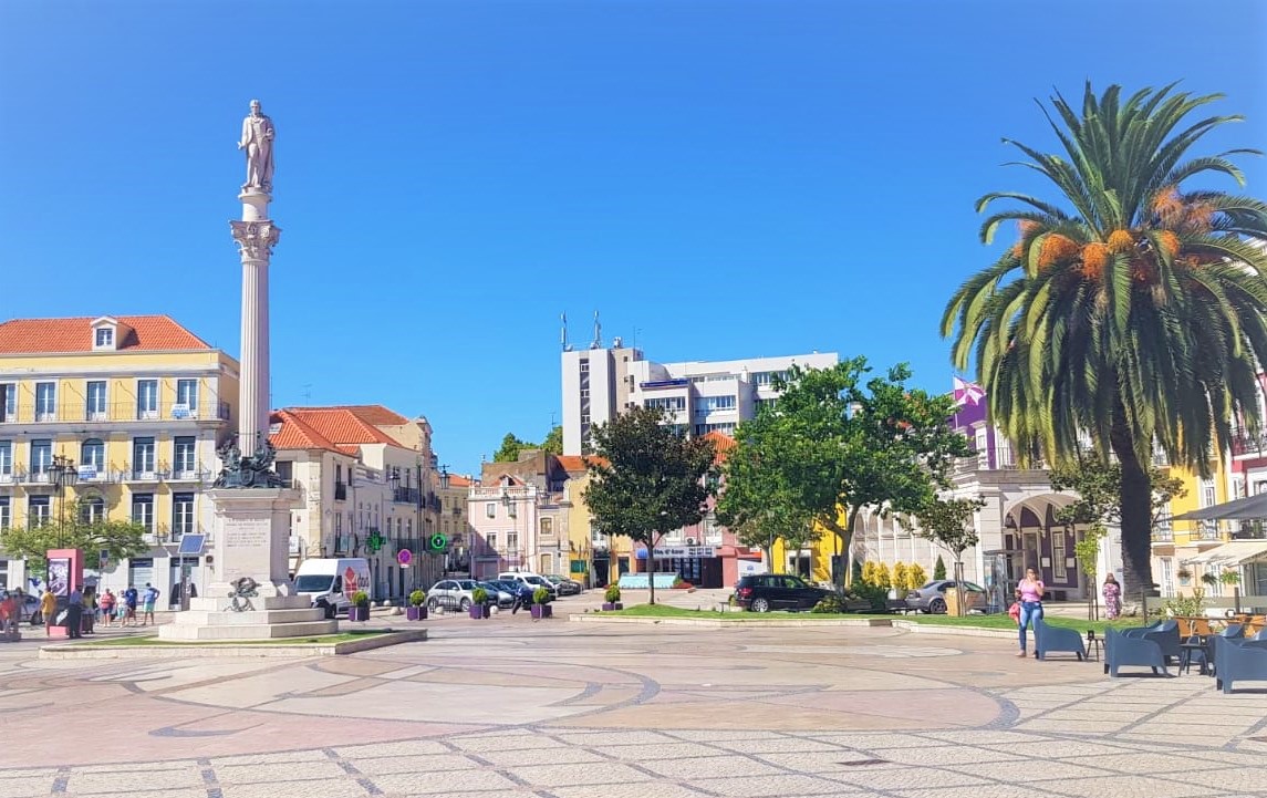 Scenic view of Setúbal, a coastal city in Portugal, highlighting the harbor and natural surroundings.